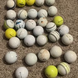 34 Used Taylor Made Golf Balls 
