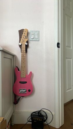 Kids Pink guitar and amp and holder