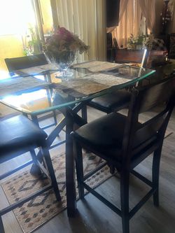 Glass diner table with 4 chairs