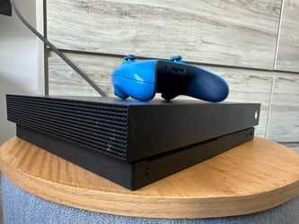 Xbox one x 1 terabyte with 18 games