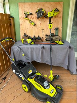 Ryobi tool and lawnmower group sale.