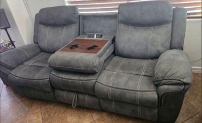 Reclining Couch With Outlet, Cup Holder Drop Table & Storage