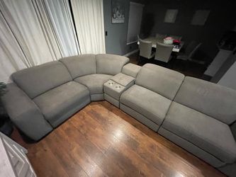 Sectional couch recliner