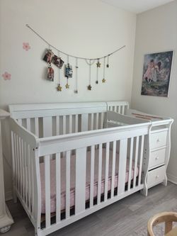 White Baby Crib with Attached Changing Table