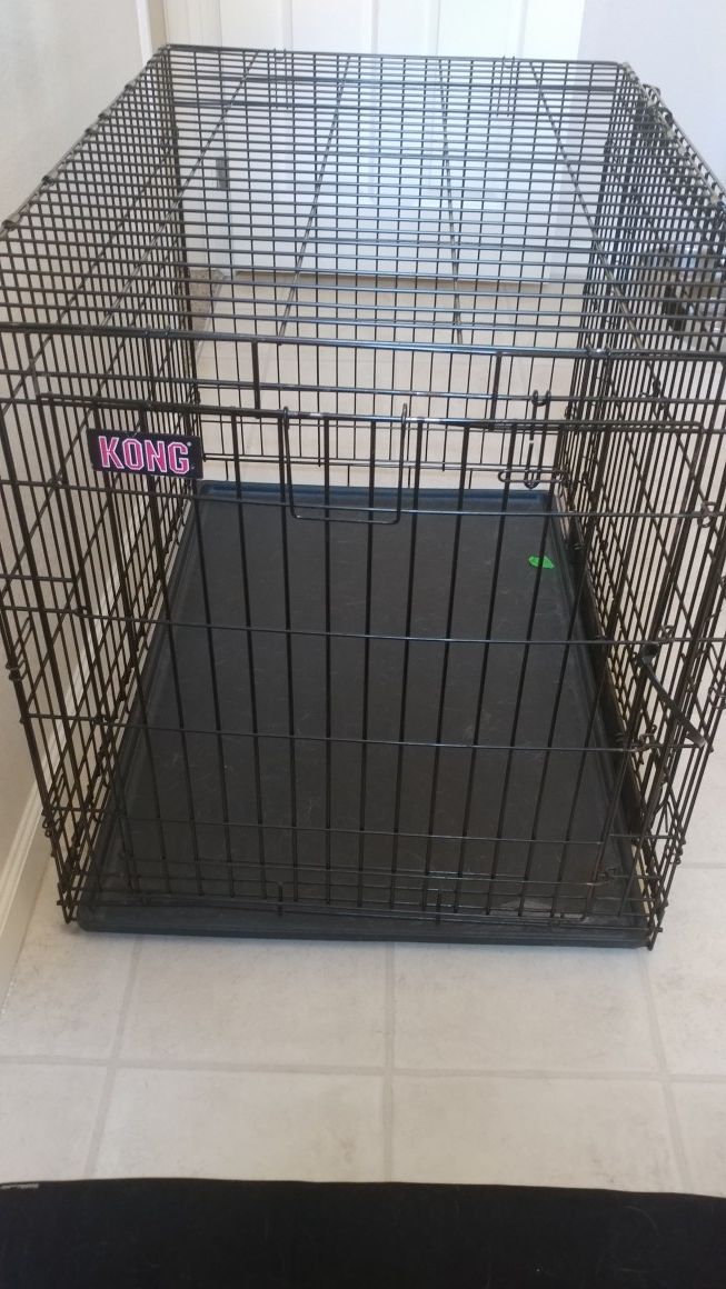 "KONG Space Saving Double-Door Pet Crate size: 43"L x 29"W x 30.5"H", Black
