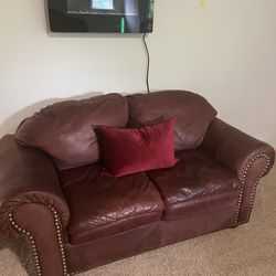 Red Completely Leather Loveseat “New Price To Go Quickly”