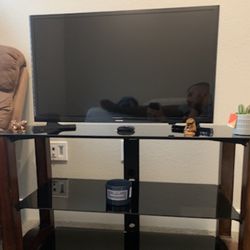 Samsung TV (comes with Roku, stand, and remotes)