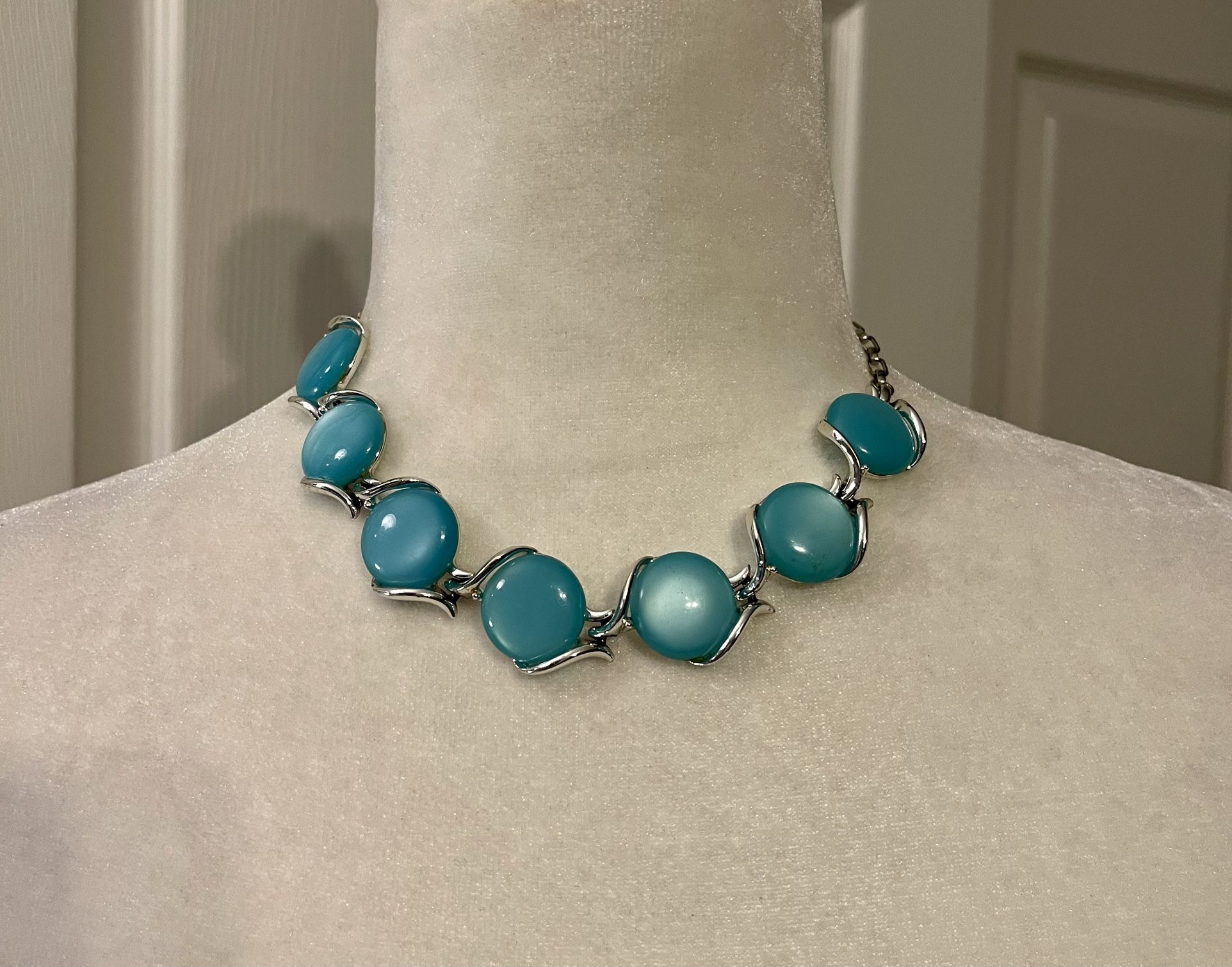 Beautiful Turquoise Colored Stone Choker Style Necklace With Gold Colored Chain And Accents.