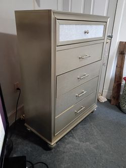 Crown mark champagne 5-drawer chest of drawer