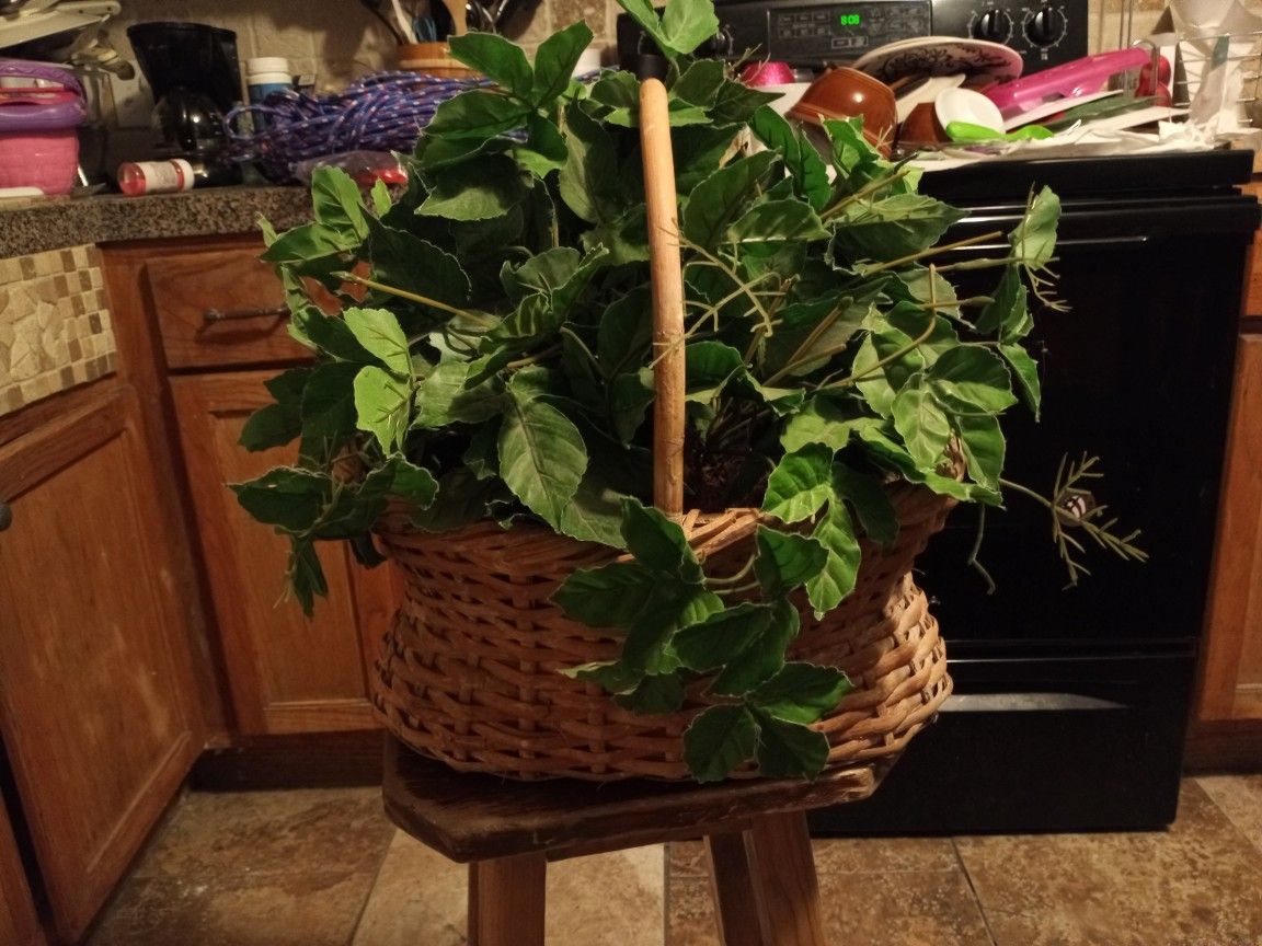 Basket with artificial plant