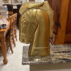 Golden metal horse head