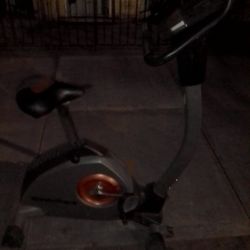 Norditrack I Fit 2.0 Bike Mint Condition For Sale . Orange Grey Gun Metal Color And About 4ft High.