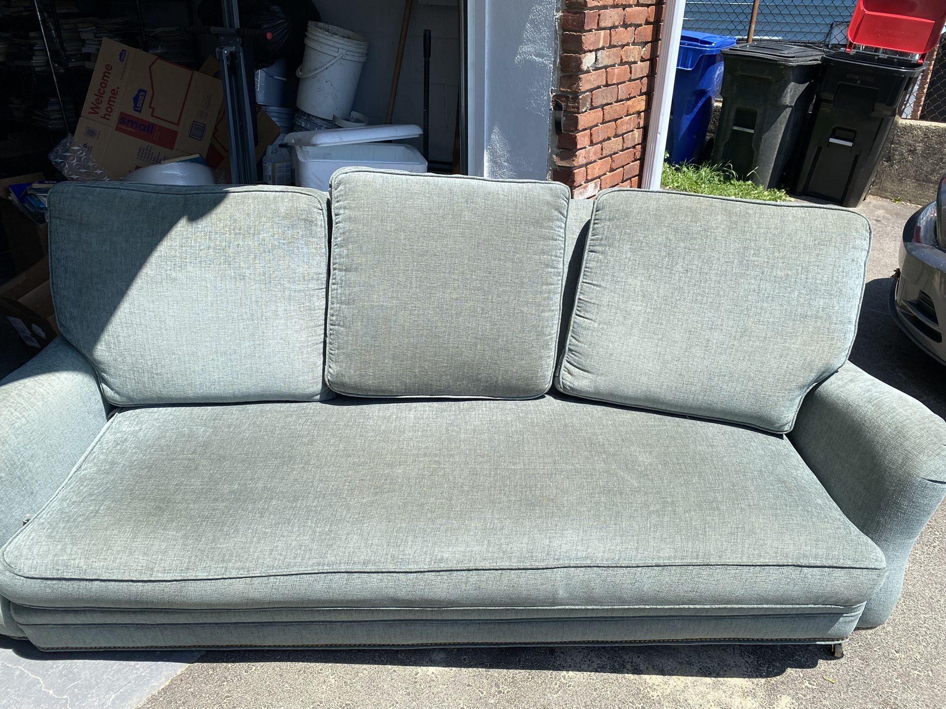 Teal Couch With Gold Studs