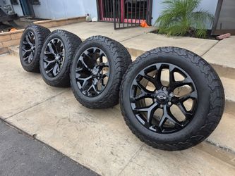 20" CHEVY rims w/ 33" BfGoodrich KO2 tires