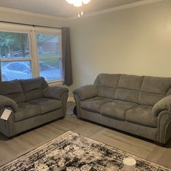 Gray Sofa and Loveseat Set. Brand new (Less than a month old) Tags still on