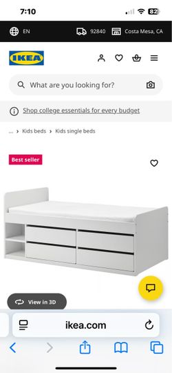 White IKEA bed with drawers