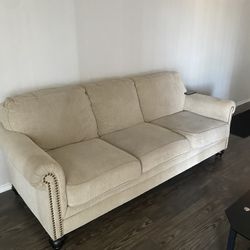 Tan Couch  With Brown Cuffs