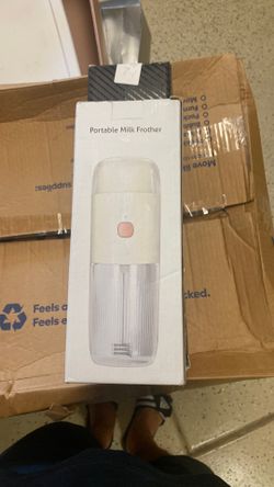 Portable milk frother