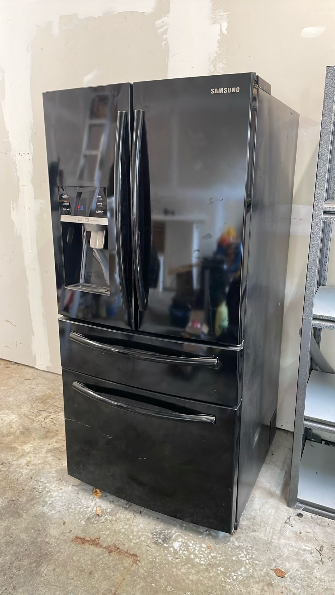 Free Samsung fridge, French doors, bottom freezer and third drawer.