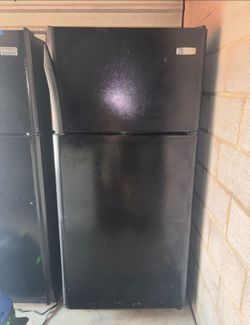 Black Frigidaire Refrigerator And Freezer