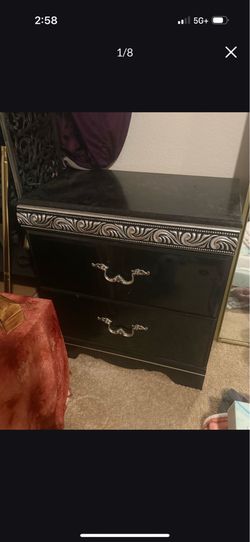 Black with sliver detailing dresser / nightstand