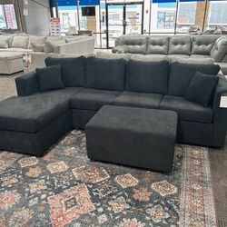 New Black Sectional And Ottoman 
