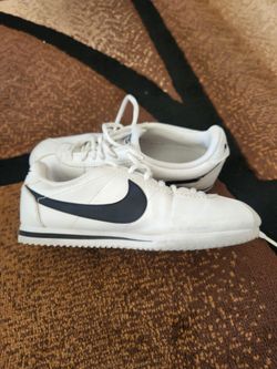 White Nike Cortez's