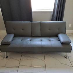 Modern Faux Leather Futon with Cupholders and Pillows