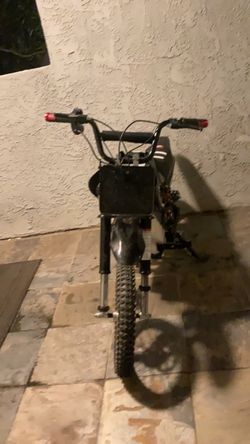 Heavily modded 50 mph razor dirt bike mx650, with 72v kit plus nice seat cover and nice full hand throttle.