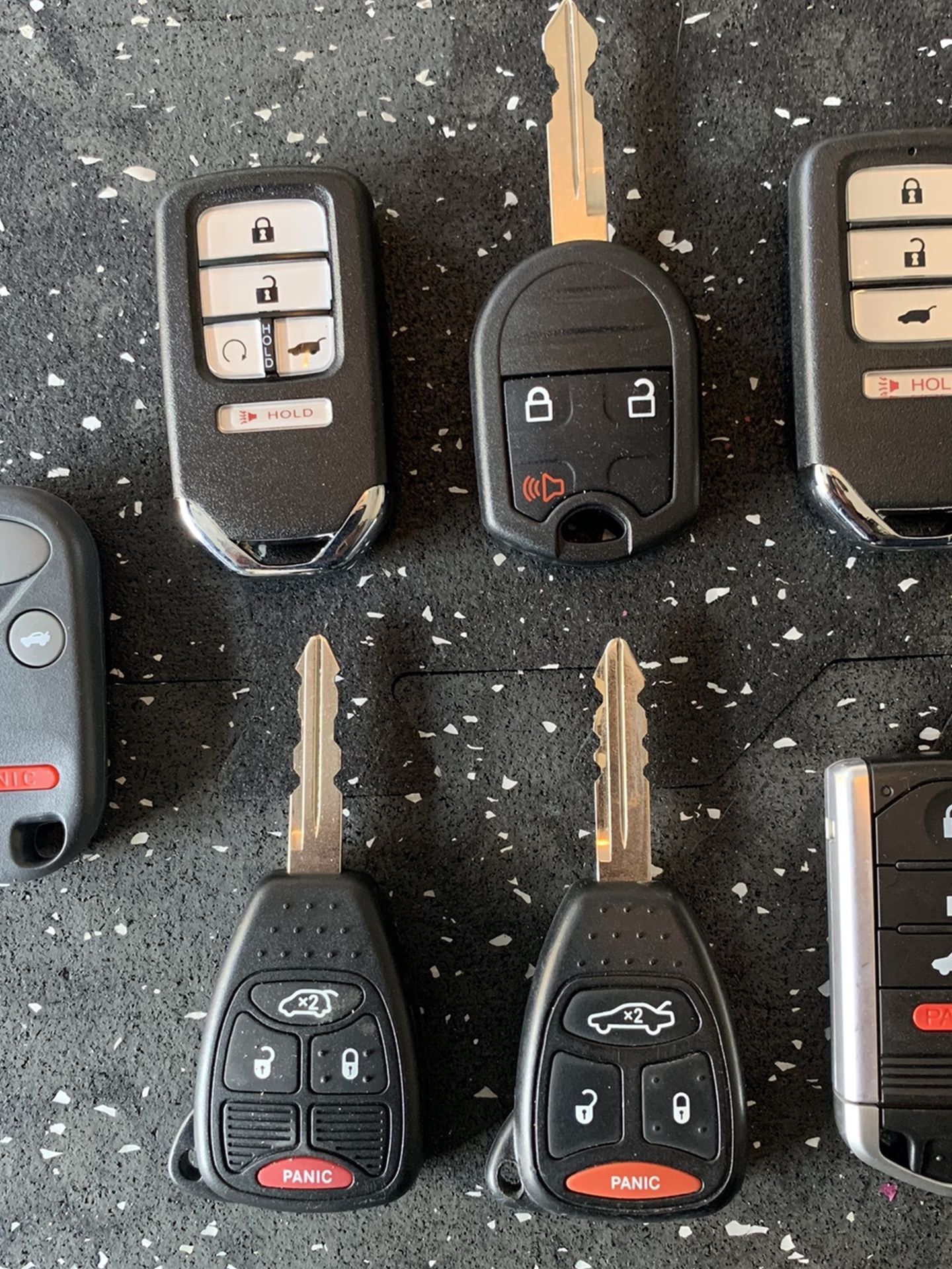 CAR KEYS • CAR REMOTES • KEY FOBS • SMART KEYS