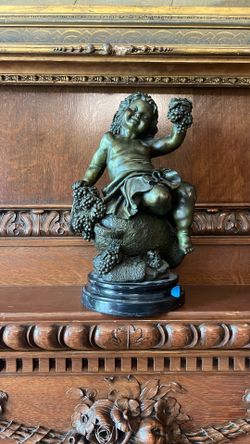 Italian Sculpture Of A Child With Grapes