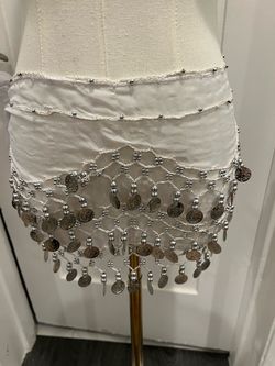 White coin belly dancer with silver coin embellishments and beading