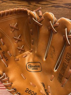 Vintage Carnation Dodgers promotional Baseball Glove Autographed by Steve Garvey and Bill Russell.