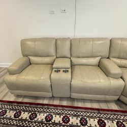 Beautiful Beige Leather Couch With Four Recliner Sectional