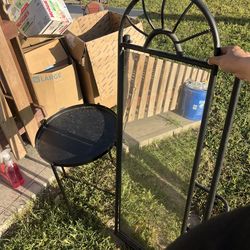 Black metal mirror and ikea side table