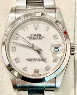 Rolex Datejust 36, reference 16200, stainless steel with the less-common white/ivory “Computer” (Jubilee) dial with Arabic numerals and smooth bezel.