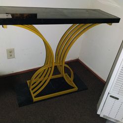 Black and gold marble table