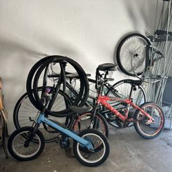 4 bikes + extra parts/tubes - $100