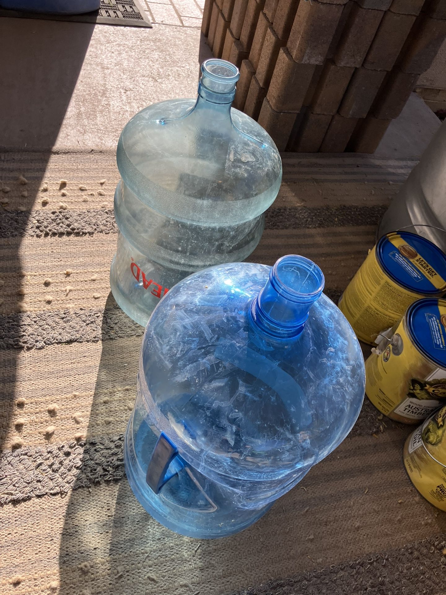 Two 5 Gallon Water Bottles