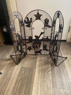 Cast iron candle holder /fire place cover