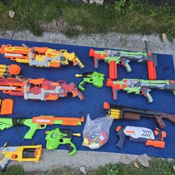 Lot of Nerf / ERTL / Super Soaker Toys