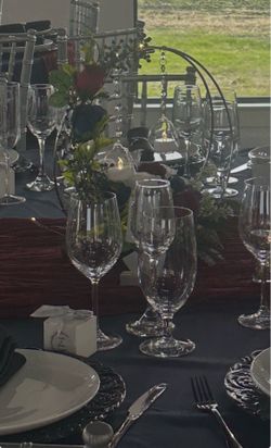 Wedding centerpieces, navy blue tablecloths, welcome sign, flower decoration, coffee bar sign