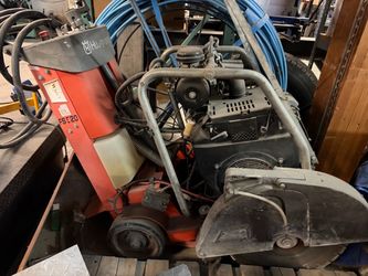 Walk behind saw