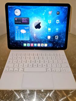 Apple iPad Air (5th Gen.)
Includes Charger & Magic Keyboard/Case
 - Unlocked