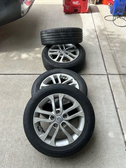Kia rims and  tires 205/55/16