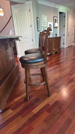 Two beautiful bar stools in perfect condition $40 each .
