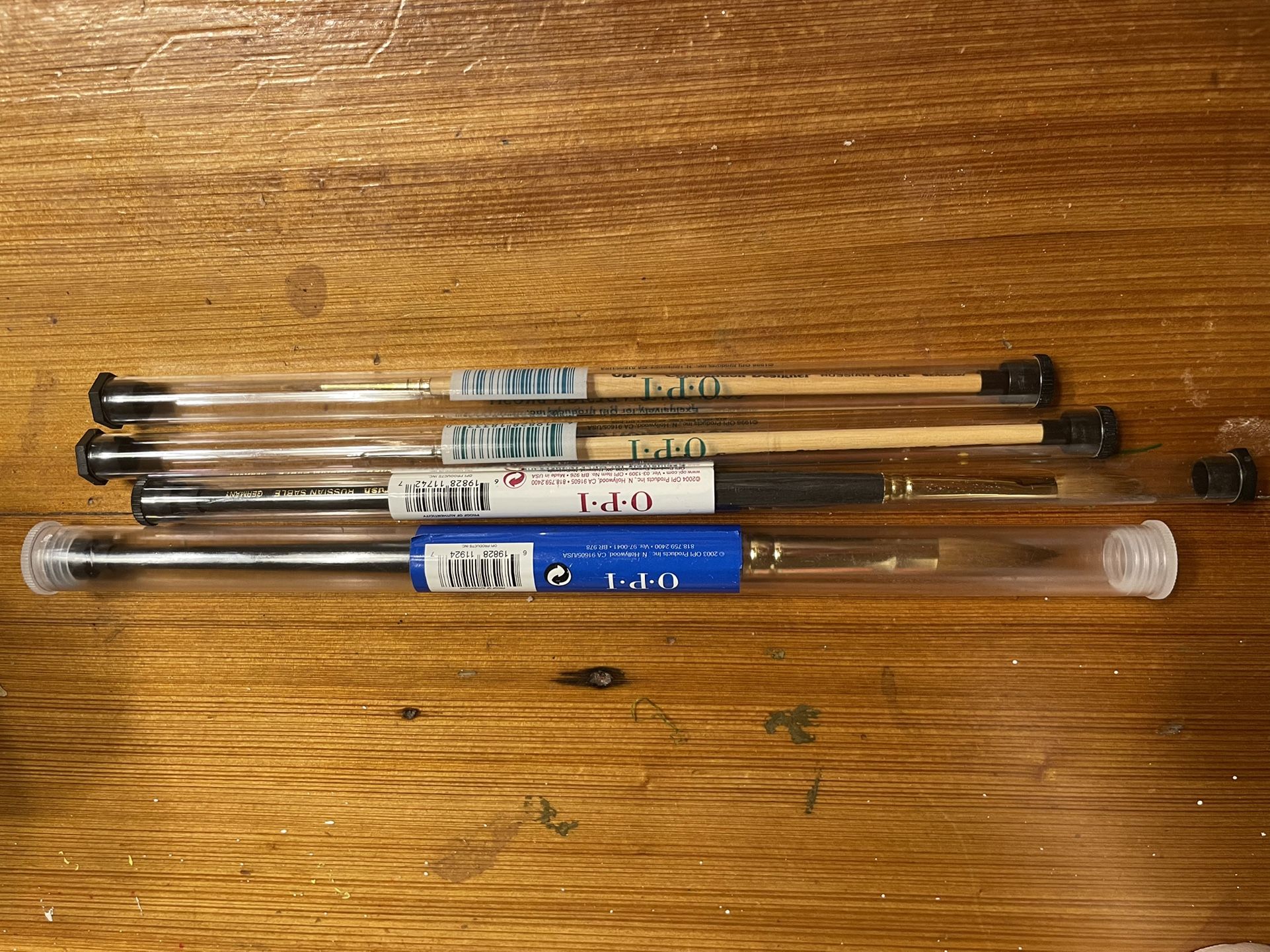Multiple O.P.I nail brushes