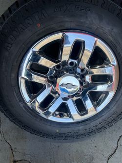 Set of 4 used wheels with tire like new for Chevy 8 lug 8x180