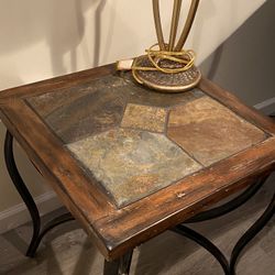 Wood and stone side table with decorative metal legs