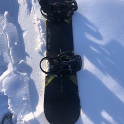 Burton custom 52 snowboard  With bag and glasses. 